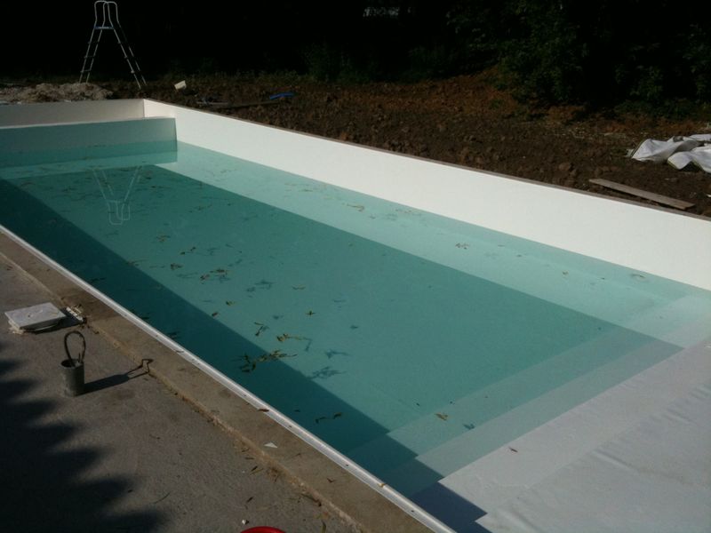 Construction d'une piscine traditionnelle haut de gamme à Perrex dans l'ain